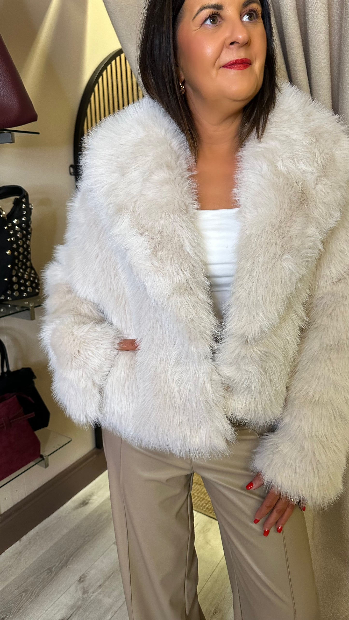 The Amora Beige Faux Fur Coat