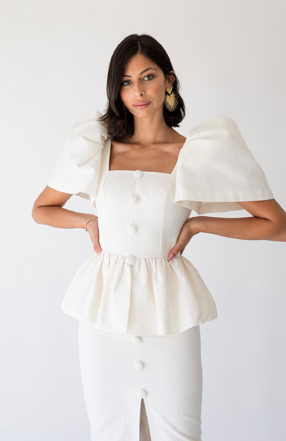 Luxe Ivory Peplum Dress